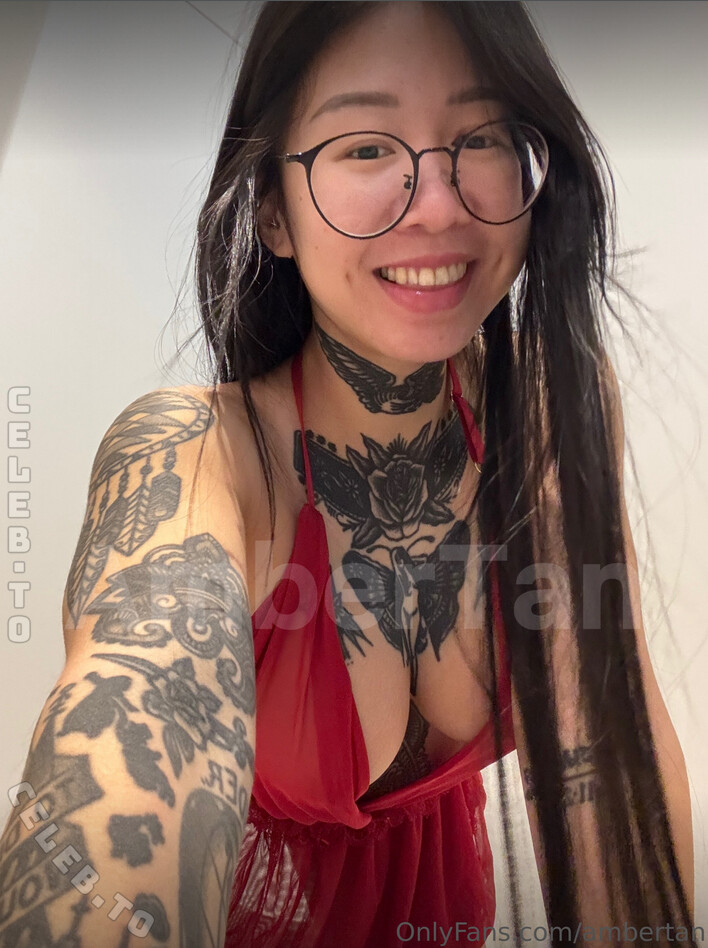 Amber Tan with DD cups nude photo 1