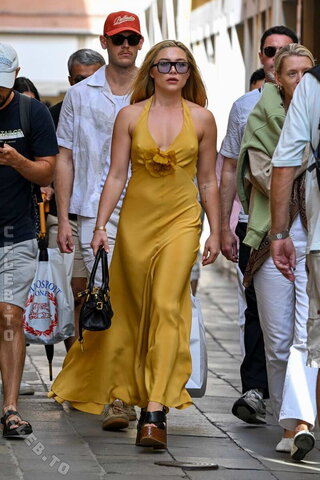 Florence Pugh pokies in a yellow dress while out shopping in Venice on September 9, 2026