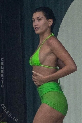 Hailey Bieber - spotted in Cabo San Lucas, Mexico, relaxing by the pool in a bikini 03/2023