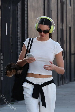 Kendall Jenner left an office building in downtown Los Angeles on August 27, 2026 #braless #seethrough