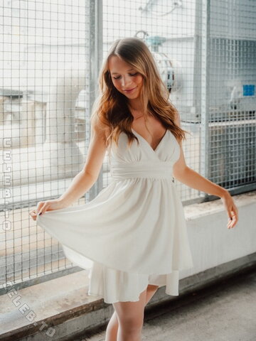 Lisa Küppers – White dress, deep neckline