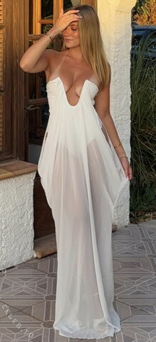 Natascha Sophie – From the Mallorca vacation, dress is somewhat transparent on the legs