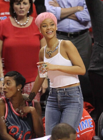 Rihanna at the Clippers Game in Los Angeles – May 2014 #braless #pokies #piercing