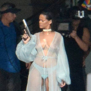 rihanna topless exposing holding a gun