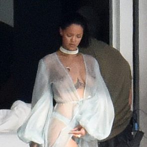 rihanna walking out of house with naked boobs